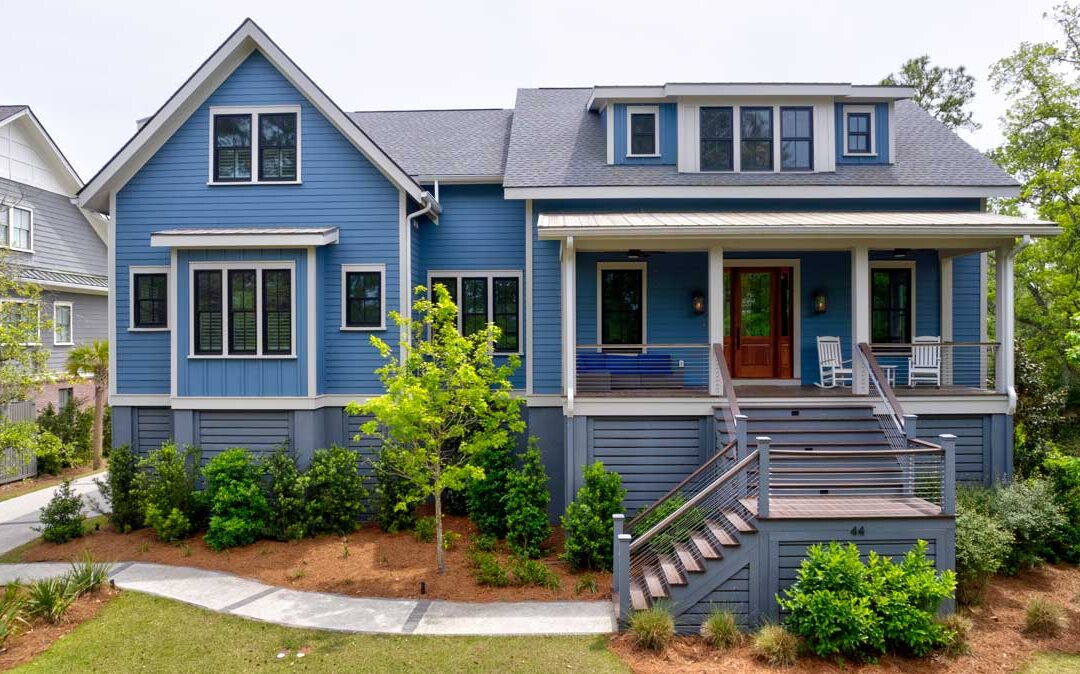 This home's exterior is stands out with it's two-tone blue exterior and trim details