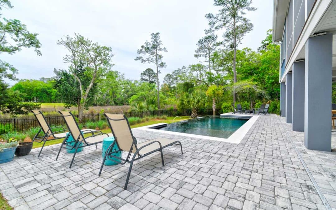 An infinity pool enhances the views of the salt marsh behind this home