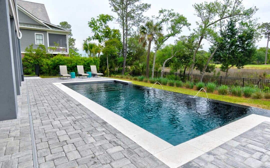 An infinity pool enhances the views of the salt marsh behind this home