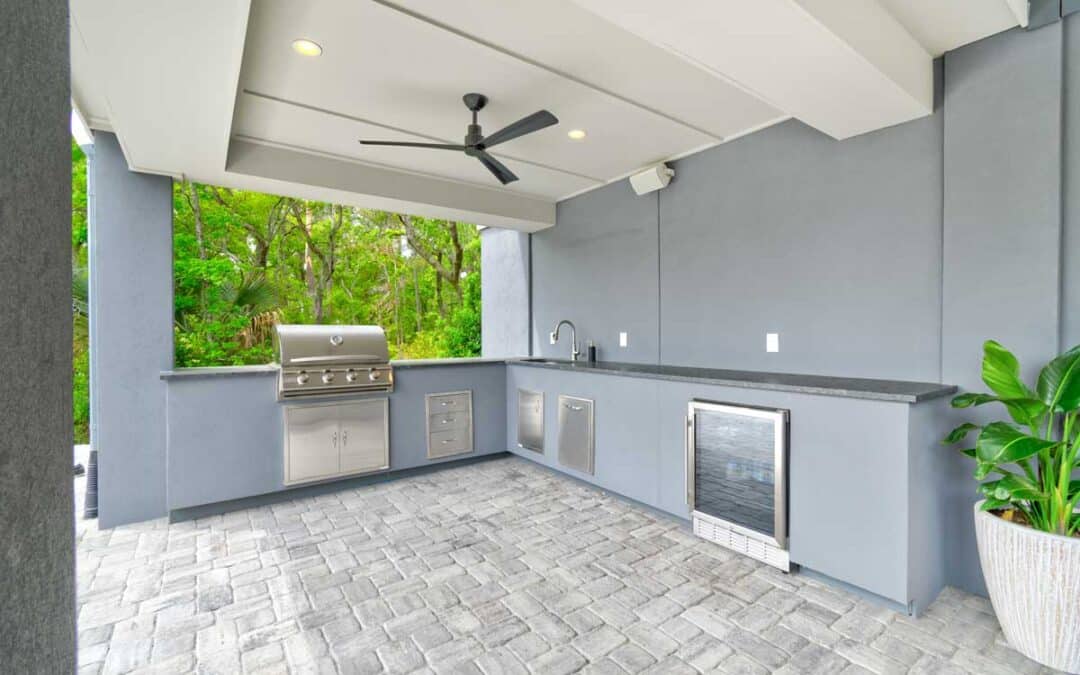 Just off the pool in the back, a full outdoor kitchen is perfect for family gatherings or entertaining