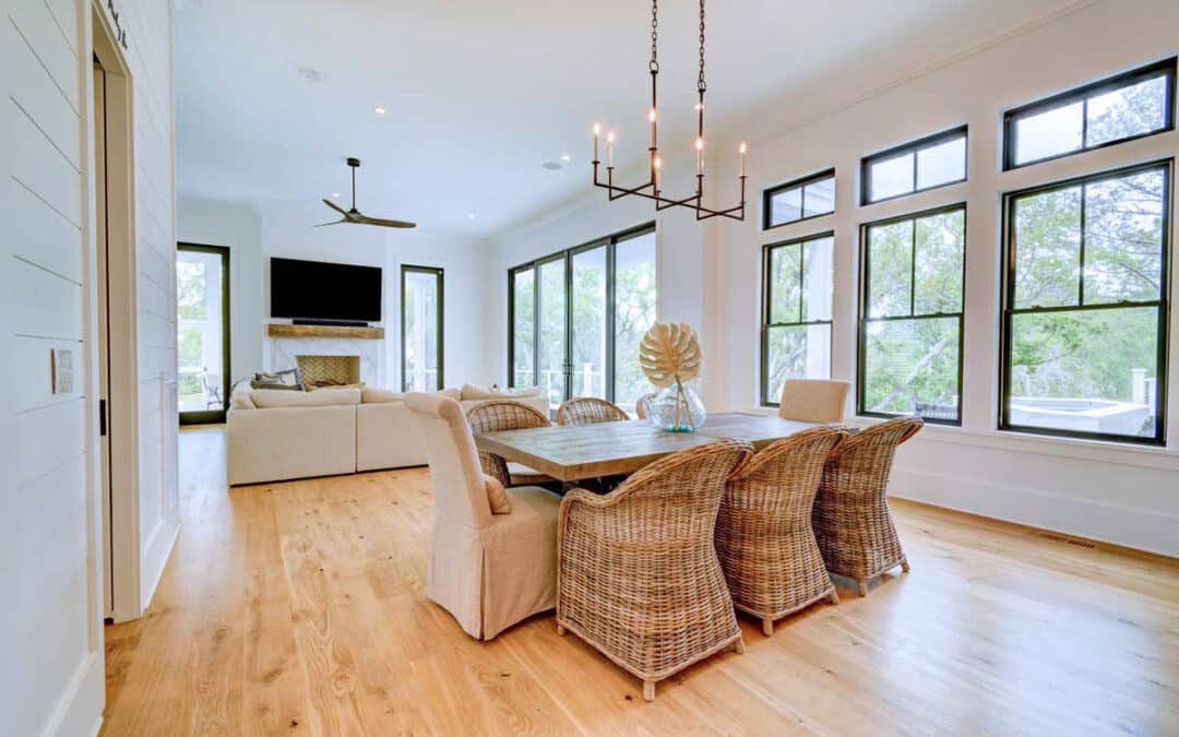 The comfortable main living area offers natural light and views of the salt marsh