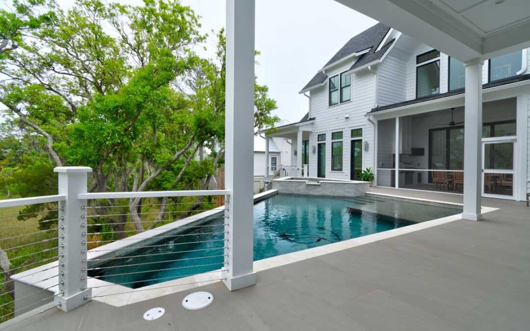 Marsh-front pool in back of house